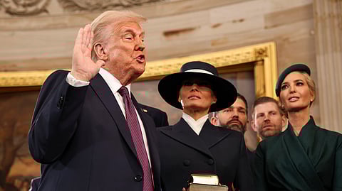 President-elect Donald Trump takes the oath of office as he is sworn in as president during the 60th Presidential Inauguration in the Rotunda of the U.S. Capitol in Washington, Monday, Jan. 20, 2025.