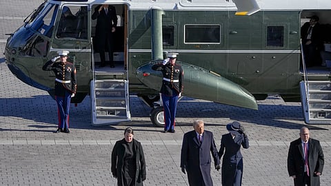 First lady Melania Trump, from second right, and President Donald Trump walk as former President Joe Biden salutes after boarding a Marine helicopter en route to Joint Base Andrews after the 60th Presidential inauguration, Monday, Jan 20, 2025, at the US Capitol in Washington