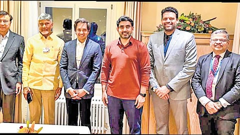 Chief Minister N Chandrababu Naidu with Executive Chairman of ArcelorMittal Nippon Steel India Lakshmi N Mittal and its CEO Aditya Mittal in Davos