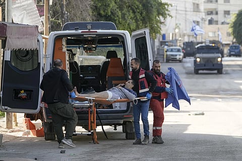 Medics evacuate a wounded man during an Israeli military operation in the West Bank city of Jenin, Tuesday, Jan 21, 2025.