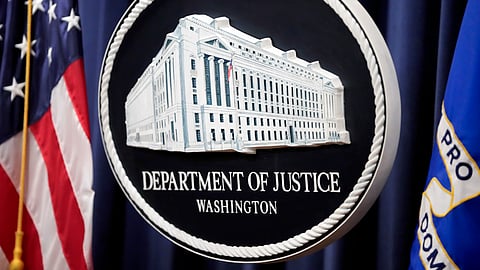 The logo for the Justice Department is seen before a news conference at the Department of Justice, Aug. 23, 2024, in Washington.