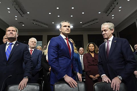 Pete Hegseth, center, Donald Trump's pick to be Defense secretary
