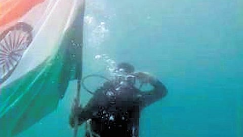 Ex-submariner’s scuba team unfurls tricolour underwater at Rushikonda