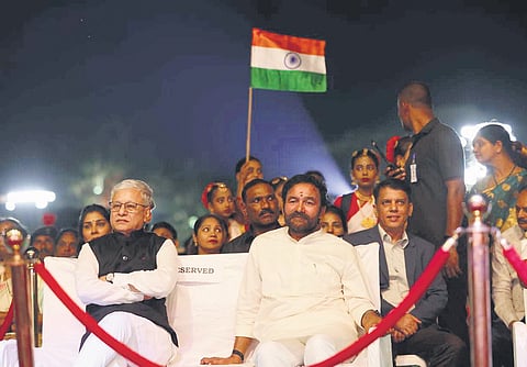 Governor Jishnu Dev Varma and Union Minister G Kishan Reddy watch as artistes perform during the Bharatha Matha Harathi programme at Hussainsagar on Sunday