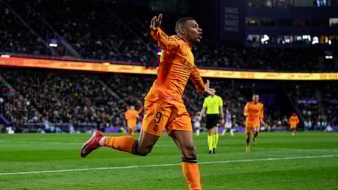 Real Madrid's Kylian Mbappe celebrates after scoring his side's second goal during the Spanish La Liga soccer match between Valladolid and Real Madrid at the Jose Zorrilla stadium in Valladolid, Spain, Saturday, Jan. 25, 2025.