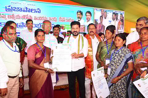 Chief Minister A Revanth Reddy launching the Indiramma Aatmeeya Bharosa scheme and issuing.