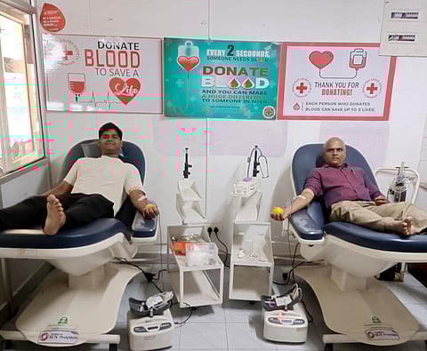 Prabhakar and his son, Abhiram, donate blood on Saturday