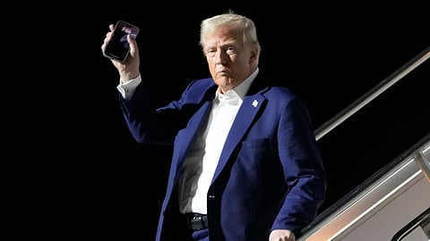 US President Donald Trump arrives on Air Force One at Harry Reid International Airport in Las Vegas, Friday, Jan. 24, 2025.