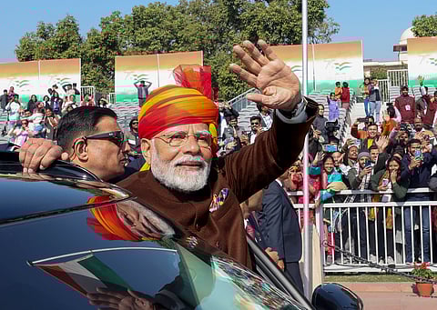 Prime Minister Narendra Modi waves during the 76th Republic Day Parade, in New Delhi, Sunday, Jan. 26, 2025.