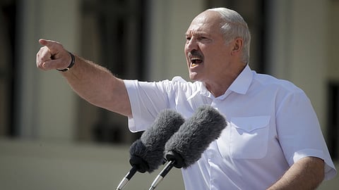 President Alexander Lukashenko gestures to supporters at Independence Square in Minsk, Belarus, on Aug 16, 2020