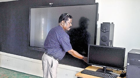 A smart classroom at a government school in Okkiyam Thoraipakkam