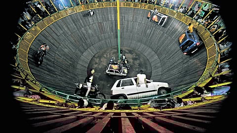 The wall of death carnival shows at Numaish exhibition in Hyderabad