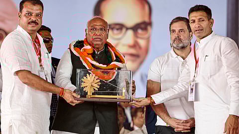 ongress President Mallikarjun Kharge with LoP in the Lok Sabha and party leader Rahul Gandhi, and Madhya Pradesh party President Jitendra Patwari during the Jai Bapu, Jai Bhim, Jai Samvidhan rally, in Mhow, Madhya Pradesh.