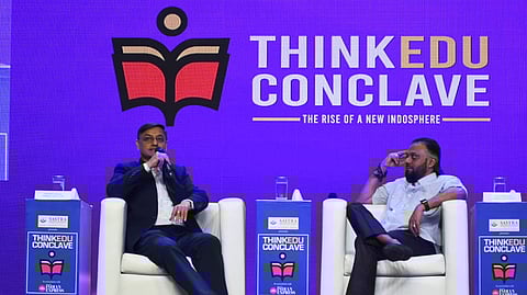 Economist and member of the Economic Advisory Council to the Prime Minister, Sanjeev Sanyal (L), speaks at the Think Edu Conclave in Chennai on Tuesday, Jan. 28, 2025.