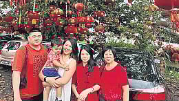 Joonie Tan with her family