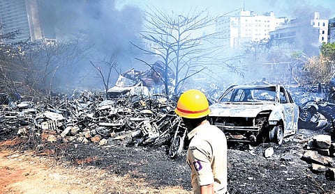 Seized vehicles parked on a vacant plot at Jakkarayanakere in Srirampuram were destroyed in a fire on Wednesday