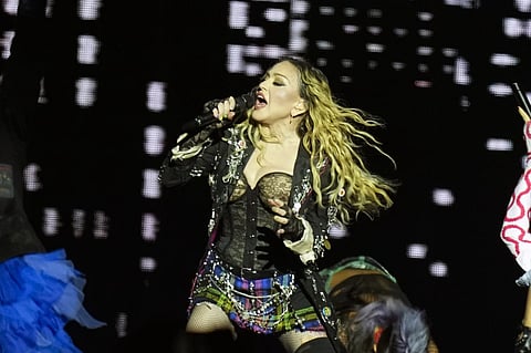 FILE - Madonna performs in the final show of her The Celebration Tour, on Copacabana Beach in Rio de Janeiro, Brazil, on May 4, 2024. Madonna will celebrate her 66th birthday with a private evening tour of the famed Italian archaeological site at Pompeii, officials said.