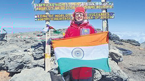 Seena Majnu on the summit of Kilimanjaro, the highest mountain in Africa