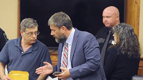 Donald Lantz, left, speaks with his attorney John Balenovich as his wife Jeanne Kay Whitefeather, right, leaves the courtroom in Kanawha County Circuit Court in Charleston, W.Va. on Wednesday, Jan 29, 2025.
