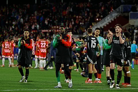 Arsenal players applaud the fans at the end of the Champions League opening phase soccer match between Girona and Arsenal at the Estadi Montilivi in Girona, Spain, Wednesday, Jan. 29, 2025.