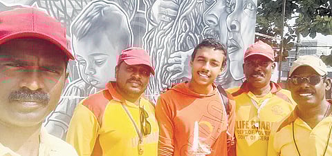 Christos Joshy along with Jeff and Shajan (immediate left and right) at Cherai beach