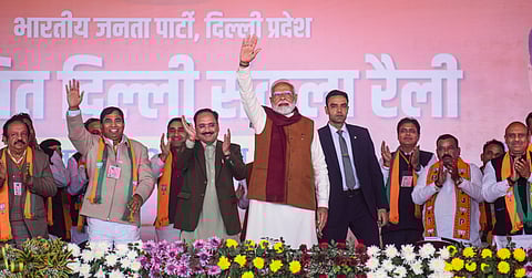 Prime Minister Narendra Modi with Delhi BJP President Virendra Sachdeva during a public meeting for Delhi Assembly elections, at Dwarka, in New Delhi, Friday, Jan. 31, 2025.