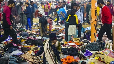 Devotees look for their belongings after a "stampede-like" situation broke out on Mauni Amavasya during the ongoing Mahakumbh Mela.