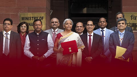 Union Finance Minister Nirmala Sitharaman with Union Minister of State for Finance Pankaj Chaudhary and other officials outside the Finance Ministry ahead of the presentation of 'Union Budget 2025-26', in New Delhi, Saturday, Feb. 1, 2025.