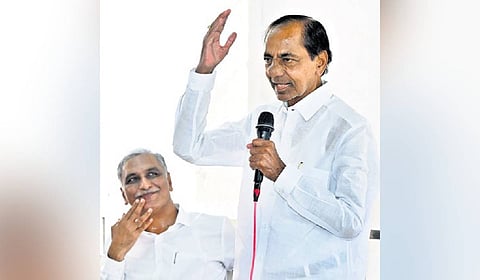 MLA T Harish Rao looks on as BRS president K Chandrasekhar Rao addresses a party workers’ meeting in Erravelli on Friday.