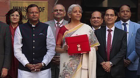 Union Finance Minister Nirmala Sitharaman outside the Finance Ministry ahead of the presentation of the Union Budget 2025-26, in New Delhi, Saturday.
