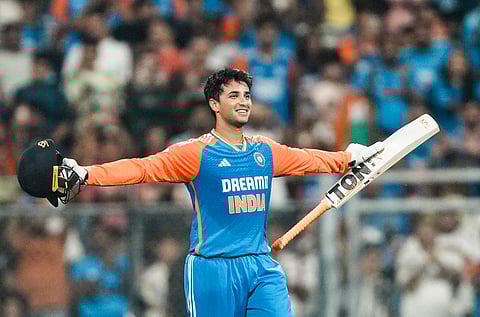 India's Abhishek Sharma celebrates his century during the fifth Twenty-20 cricket match between India and England at the Wankhede Stadium, in Mumbai, Sunday, Feb. 2, 2025.