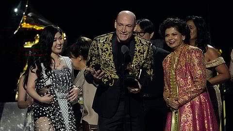 Eru Matsumoto, from left, Wouter Kellerman, and Chandrika Tandon accept the award for best new age, ambient, or chant album for "Triveni" during the 67th annual Grammy Awards on Sunday, Feb. 2, 2025, in Los Angeles
