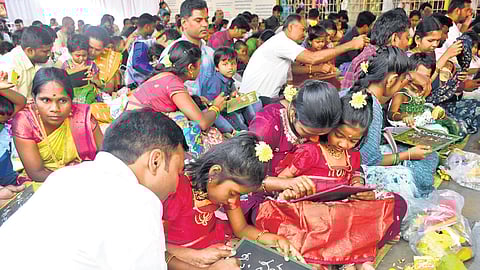 Aksharabhyasam at a Saraswathi temple in Secunderabad on the occasion of Vasantha Panchami