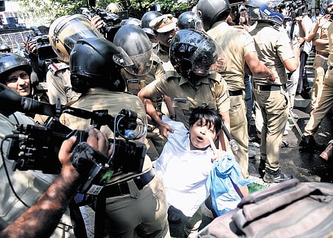 Police forcibly remove KSU activists after a protest march to the KSU Ernakulam District Committee Commissioners office turned violent in protest against the school and polices action in protecting the students accused in the death of Mihir.