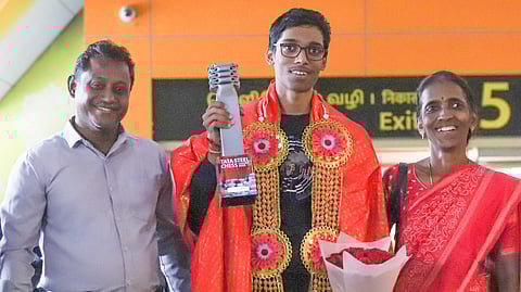 R Praggnanandhaa with his mother Nagalakshmi at Chennai airport on Tuesday