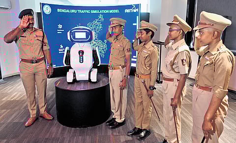 Four children battling cancer, dressed in police uniforms as part of World Cancer Day, salute Joint Commissioner of Police (Traffic) MN Anucheth in Bengaluru on Tuesday