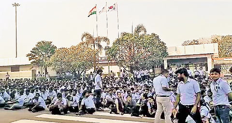 Samsung workers staging a sit-in against the suspension of 3 SIWU office-bearers at the company’s manufacturing unit in Sriperumbudur on Wednesday