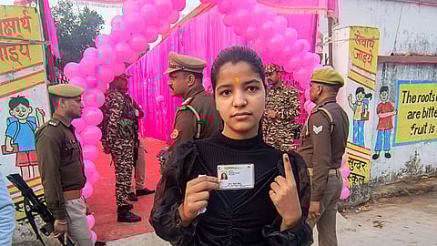 19-year-old first-time voter Mohini Tiwari shows her finger marked with indelible ink after casting her vote during the Milkipur Assembly constituency by-elections in Ayodhya district, Wednesday, Feb. 5, 2025.