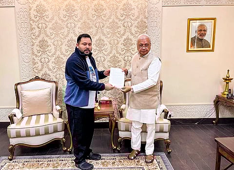 Bihar Governor Arif Mohammed Khan being presented a memorandum by LoP in Bihar Assembly and RJD leader Tejashwi Yadav regarding the alleged deterioration of law and order situation in the state, in Patna.