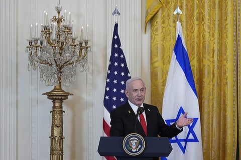 Israeli Prime Minister Benjamin Netanyahu speaks during a news conference with President Donald Trump in the East Room of the White House, Tuesday, Feb. 4, 2025, in Washington.