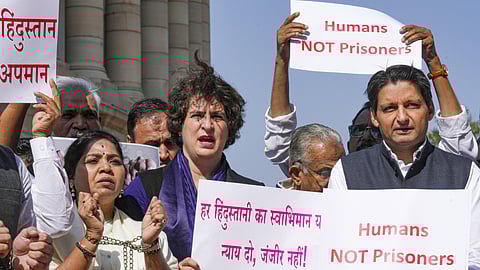 Congress MPs Priyanka Gandhi Vadra and Deepender Singh Hooda at a protest against the deportation of Indian immigrants from the US, at Parliament House complex during the Budget session, in New Delhi, Thursday, Feb. 6, 2025.