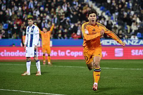 Real Madrid's Spanish forward #30 Gonzalo Garcia celebrates scoring their third goal during the Spanish Copa del Rey quarter-final first leg football match between Club Deportivo Leganes SAD and Real Madrid on February 5, 2025.