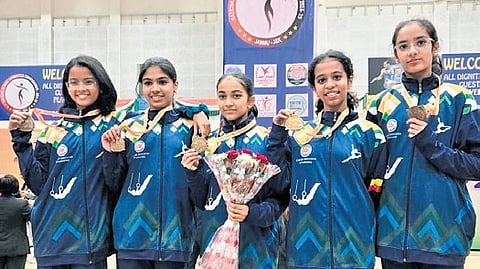 (From left) Riyanshi Patnaik, Poorvi Boopashkumar, Vigya Gupta, Unnati Bokaria and Nishka Bedi pose for a group photograph after winning the gold medal at National Aerobic Championship in Jammu and Kashmir.