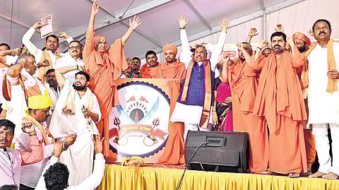 Former DCM K S Eshwarappa and seers during the launch of Krantiveera Brigade in Basavana Bagewadi, Vijayapura district