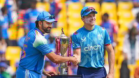 India's captain Rohit Sharma and England's captain Jos Buttler pose with the series trophy during the toss before the start of the first ODI cricket match between India and England, at Vidarbha Cricket Association stadium in Nagpur, Maharashtra.