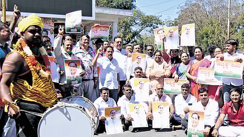 Congress workers celebrate in Mysuru on Friday