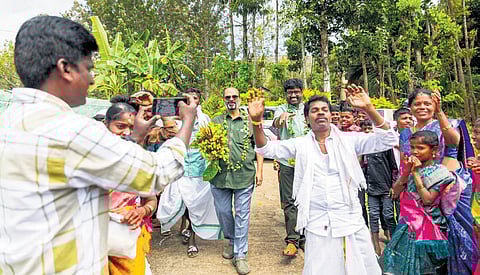 Villagers welcoming N Maheswaran at Baralikadu in Coimbatore, acknowledging the assistance he has provided to them