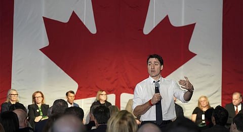 Prime Minister Justin Trudeau addresses a Canada-U.S. economic summit in Toronto, Friday, Feb. 7, 2025.