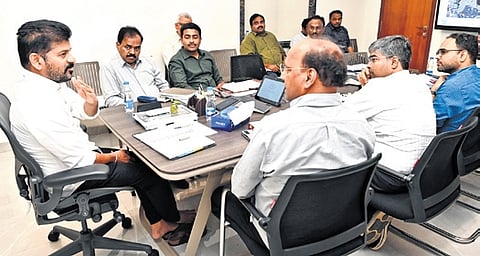CM A Revanth Reddy at a meeting with senior MAUD and GHMC officials
