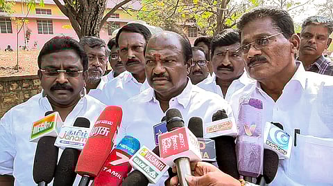 DMK candidate VC Chandirakumar (C) addresses the media outside a counting center during the counting of votes for the Erode East Assembly by-election, in Erode district, Tamil Nadu, Saturday, Feb. 8, 2025.